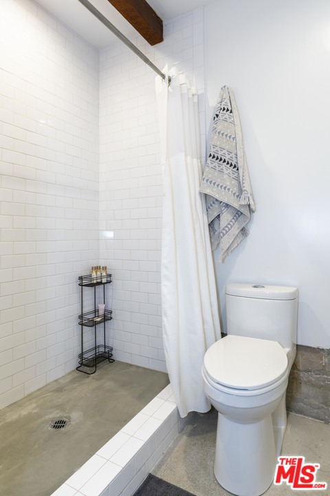 1341 Edgecliffe Drive Los Angeles, CA 90026 - Photo 50 of 51 a bathroom with a toilet and a shower
