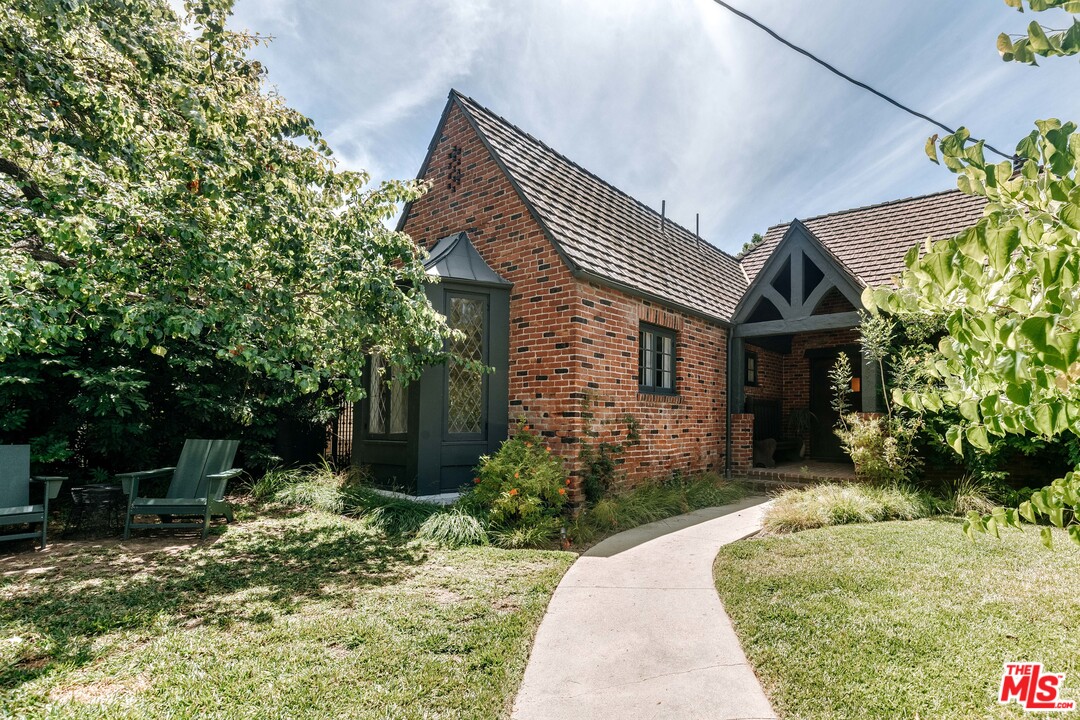 1341 Edgecliffe Drive Los Angeles, CA 90026 - Photo 8 of 51 a front view of a house with a yard