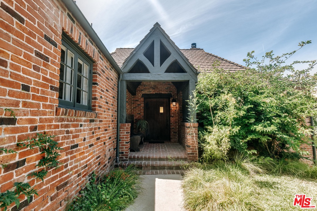 1341 Edgecliffe Drive Los Angeles, CA 90026 - Photo 10 of 51 a front view of a house with a yard