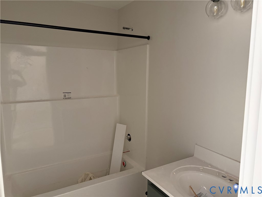 15135 Lebanon Road Spring Grove, VA 23881 - Photo 12 of 19 White acrylic shower and bathtub combination with