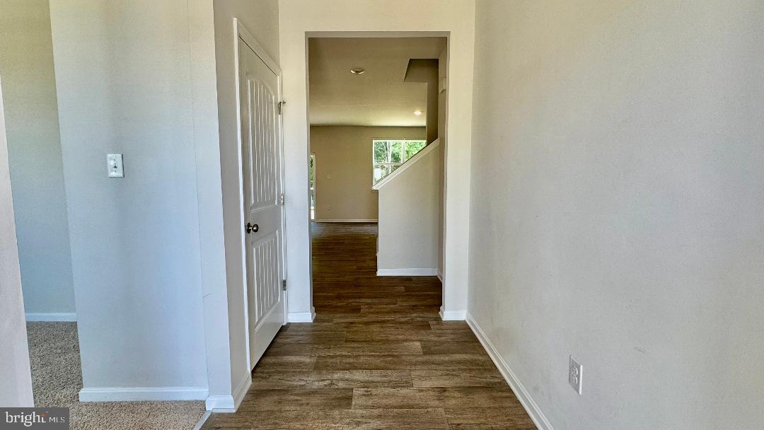 1236 Pimpernell Path Middletown, DE 19709 - Photo 30 of 37 a view of a hallway with wooden floor