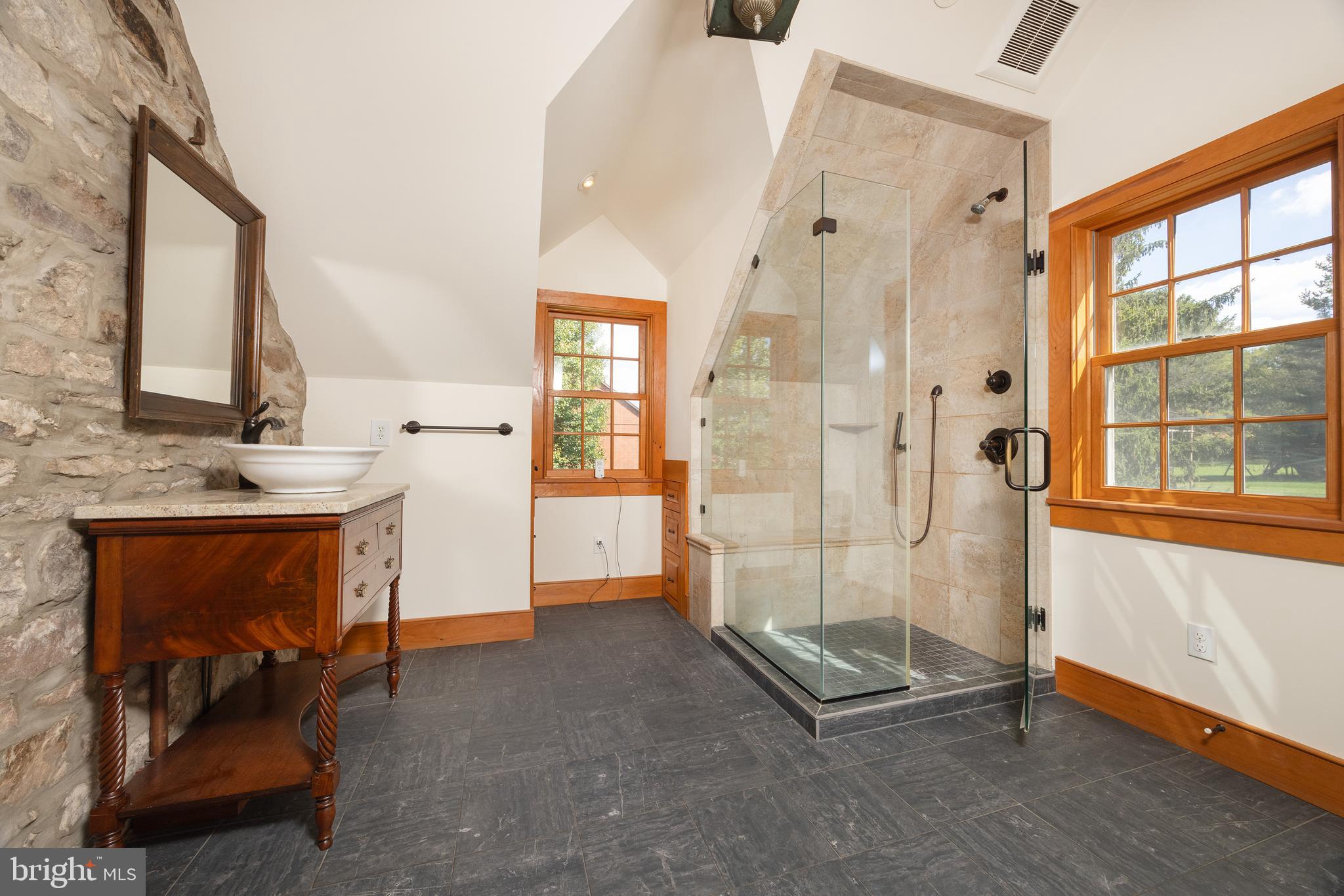 4001 Street Road Doylestown, PA 18902 - Photo 20 of 38 a bath room with a bath tub and a shower
