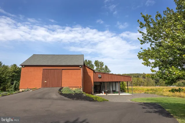 front view of the house with a yard