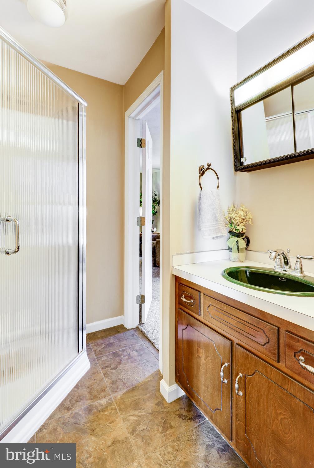1012 Rabbit Hill Road Lititz, PA 17543 - Photo 7 of 13 a kitchen with stainless steel appliances granite countertop a refrigerator and a sink