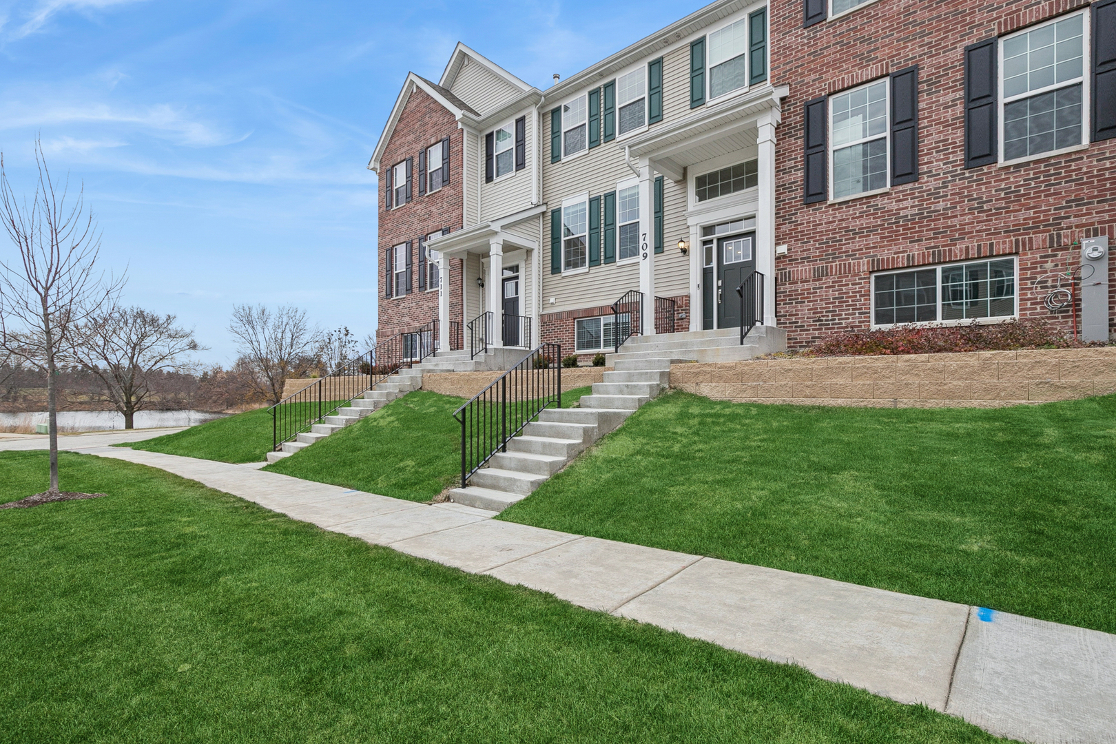 a view of a building with a yard