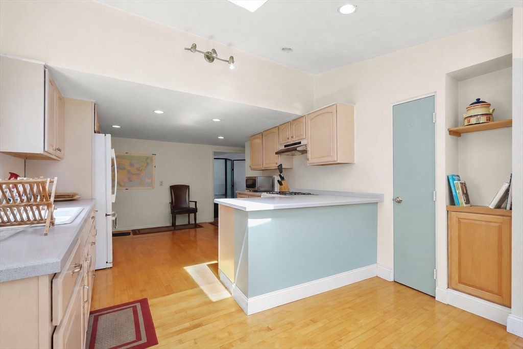 94 Fearing Hill Road Wareham, MA 02576 - Photo 20 of 41 a view of kitchen and kitchen with sink