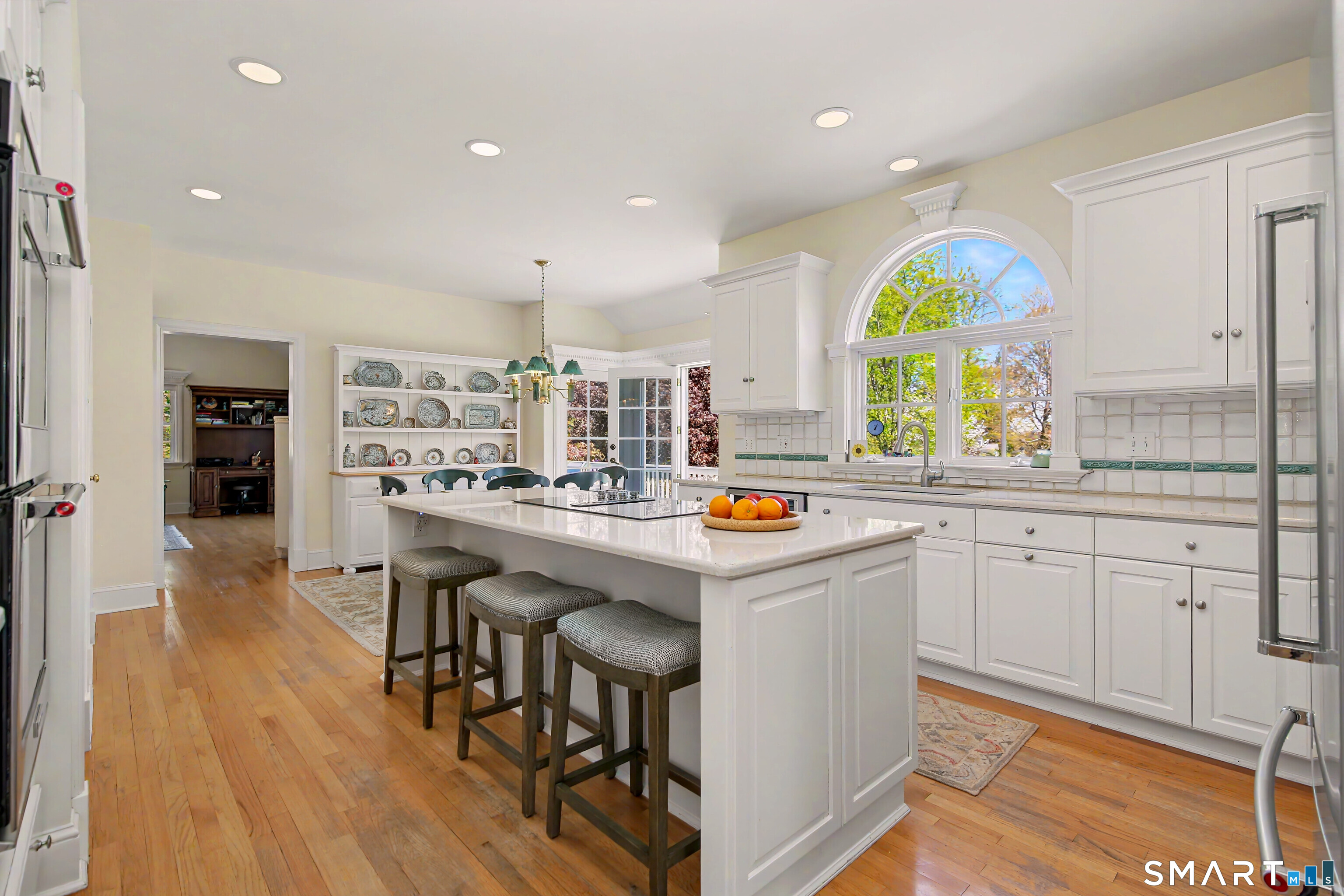7 Jeremiah Sanford Road Redding, CT 06896 - Photo 10 of 40 Spacious well appointed kitchen enjoys an eating bar island