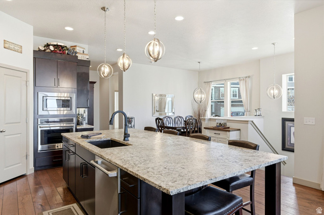 987 East Deer Arch Lane Draper, UT 84020 - Photo 15 of 46 Kitchen, formal dining, and stairs to basement.