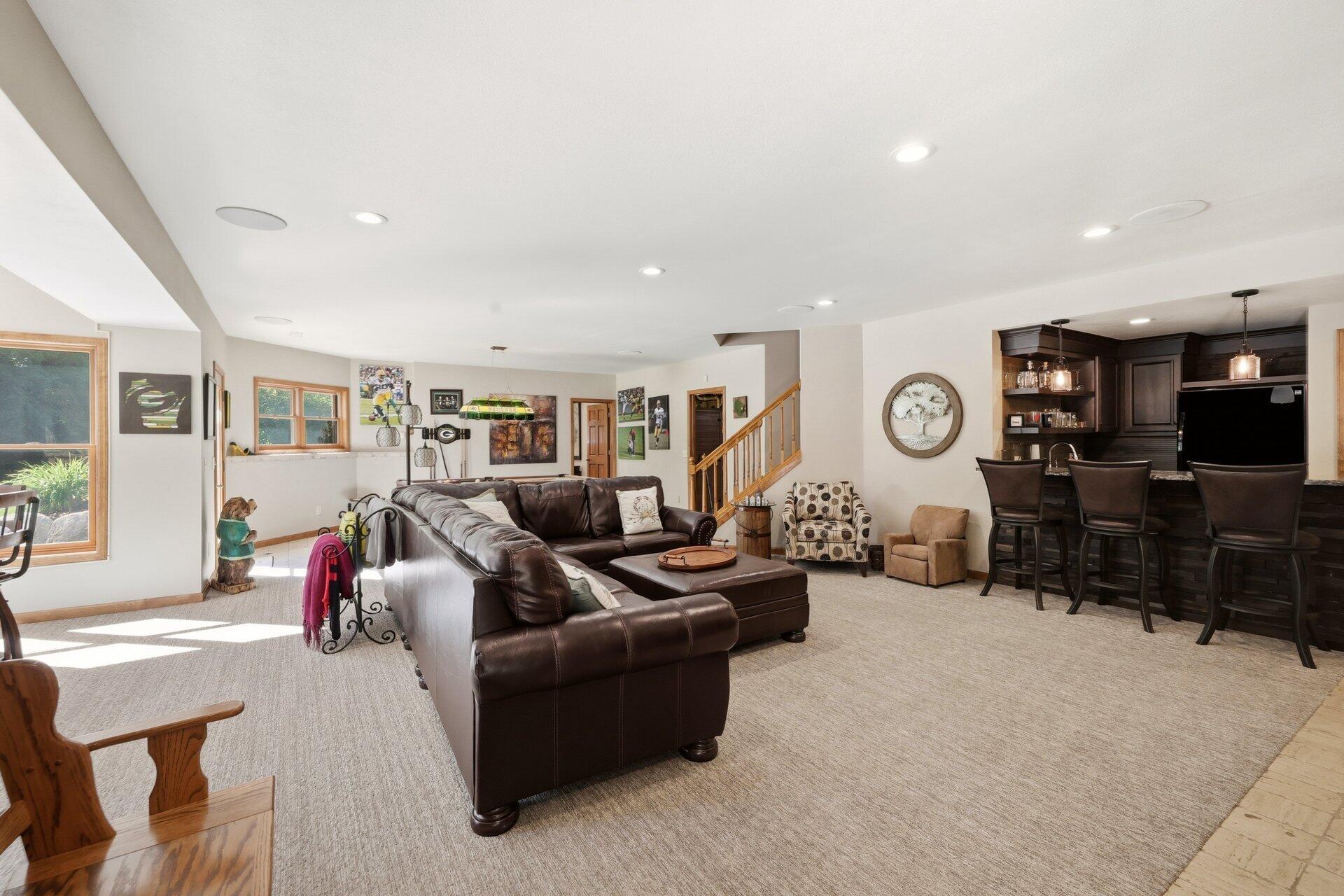 9325 East Six Corners Road Johnstown, WI 53563 - Photo 26 of 42 Family room open to Bar