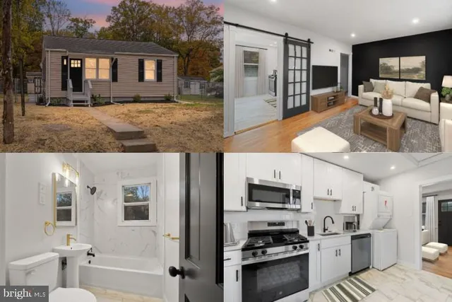 a view of kitchen with sink and refrigerator