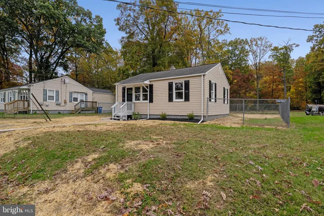 a house view with a garden space