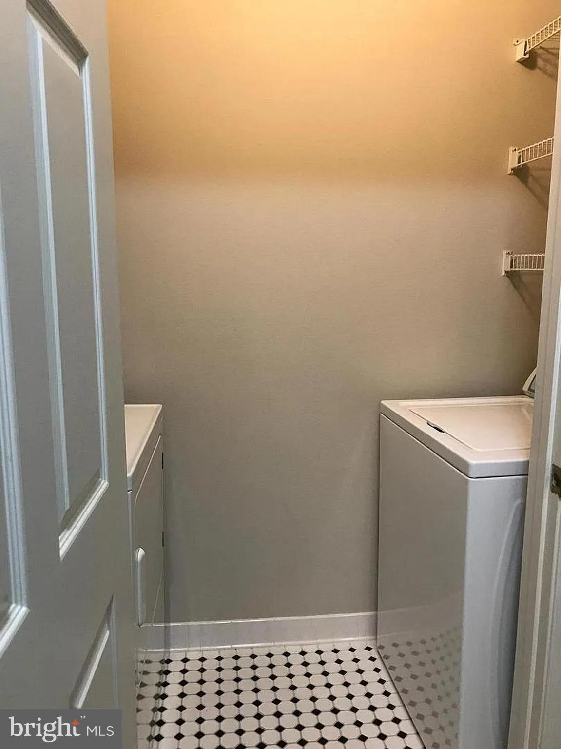 1580 Spring Gate Dr., Unit 4314 McLean, VA 22102 - Photo 17 of 36 a bathroom with a sink and a toilet