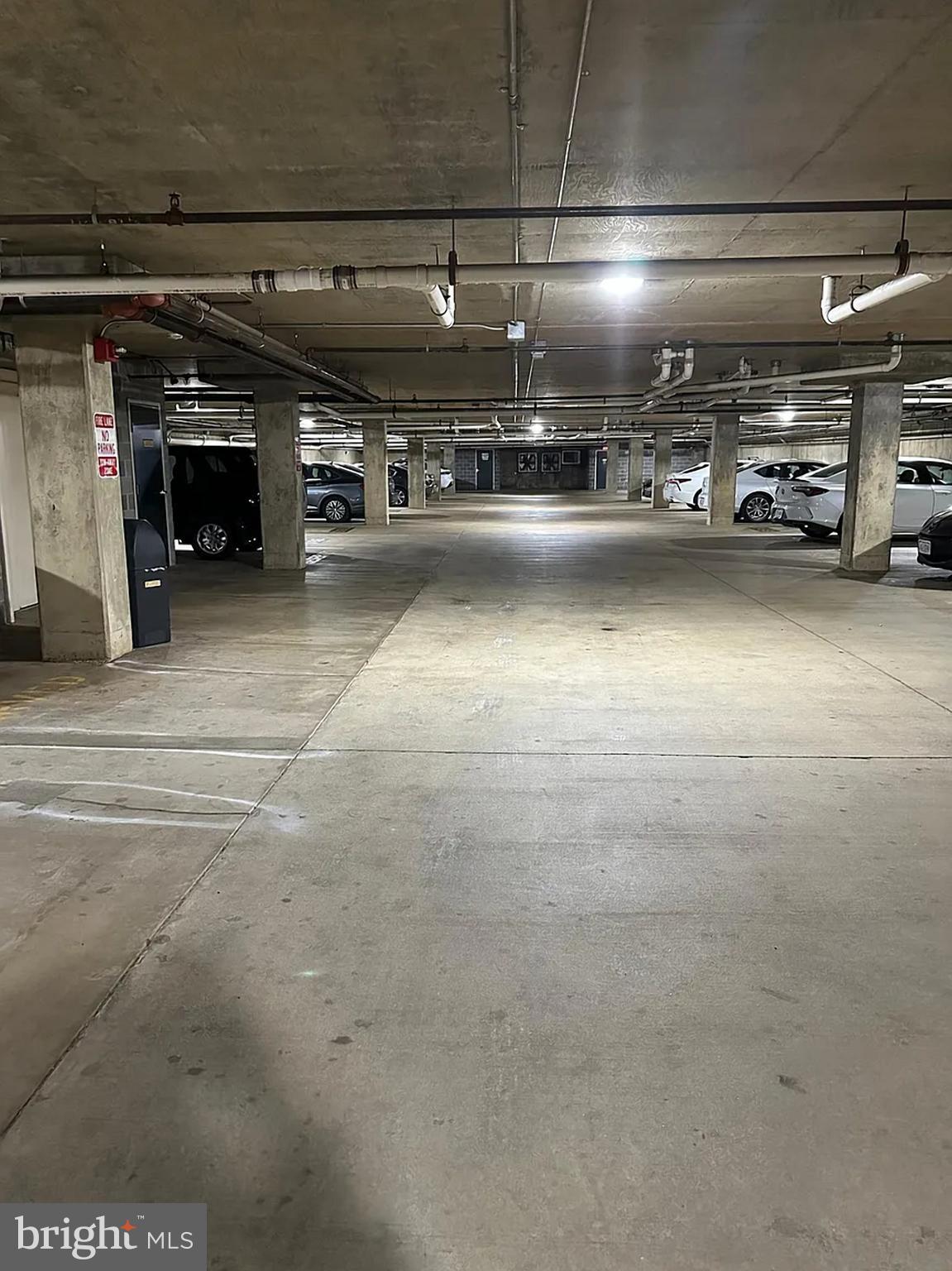 1580 Spring Gate Dr., Unit 4314 McLean, VA 22102 - Photo 19 of 36 a view of parking garage with cars