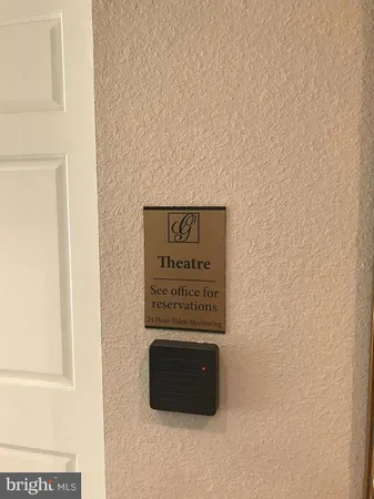 a sign that is sitting on a refrigerator