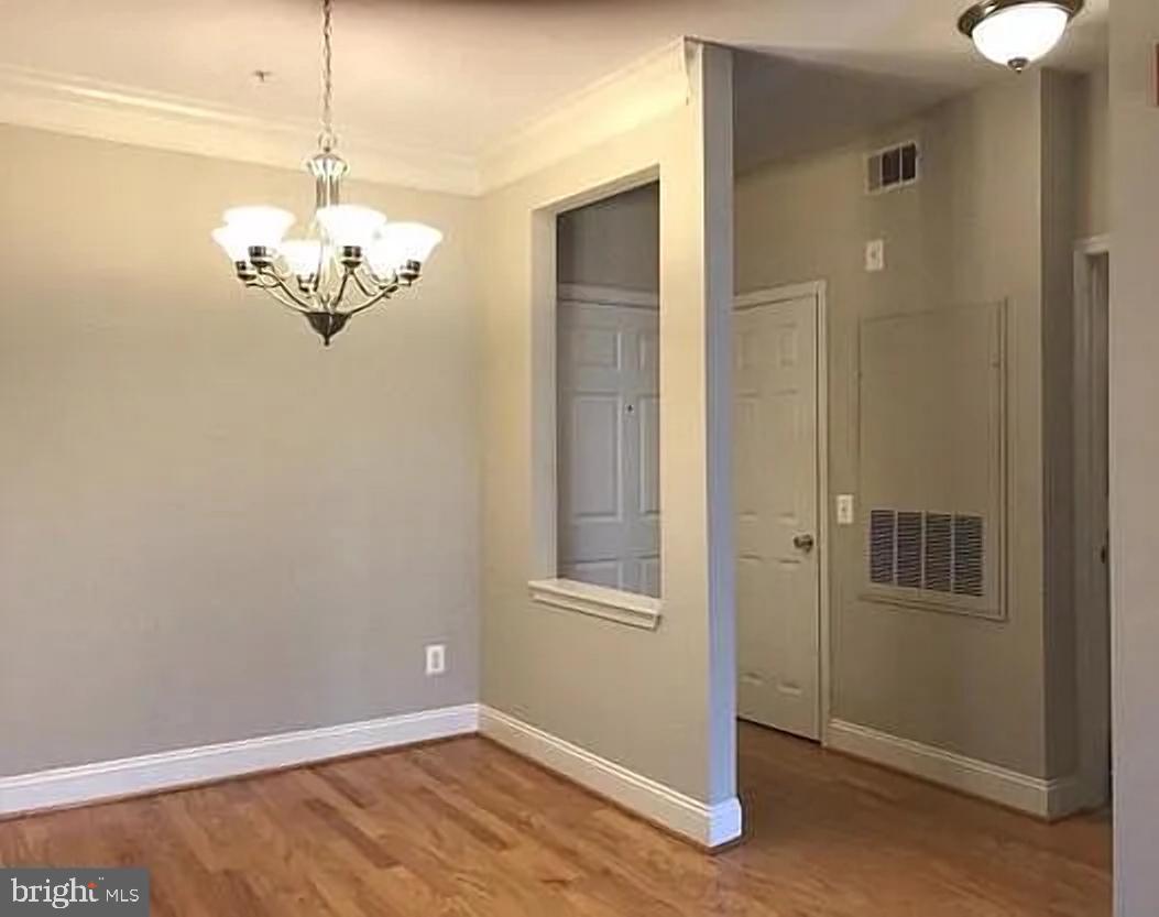 1580 Spring Gate Dr., Unit 4314 McLean, VA 22102 - Photo 5 of 36 en view interior of the house and chandelier window