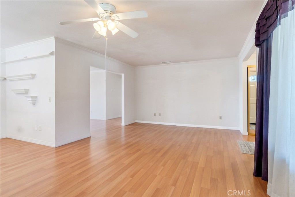 9130 Duncan Avenue Riverside, CA 92503 - Photo 6 of 34 wooden floor in an empty room with a window