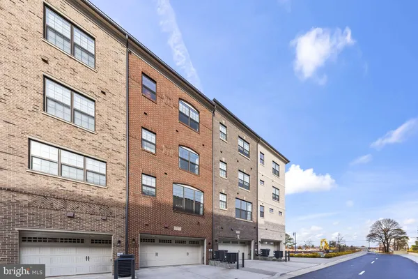 a city street lined with tall buildings