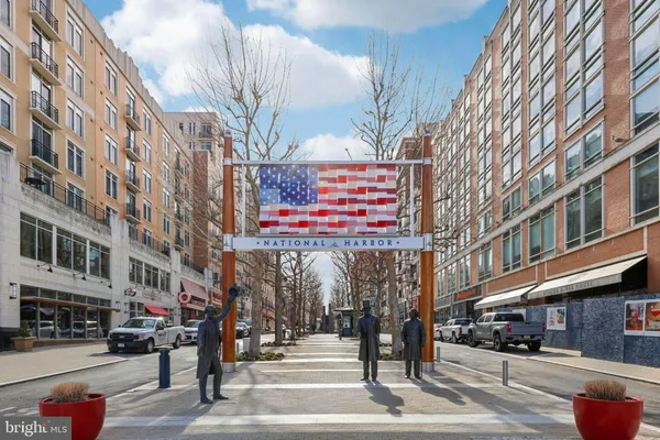 a sign on a pole on a street