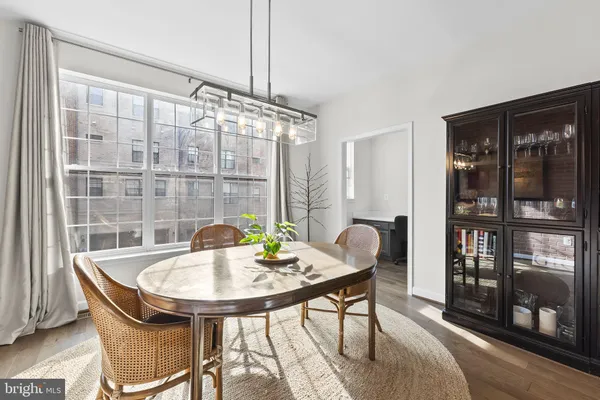 a view of a table and chairs in the room