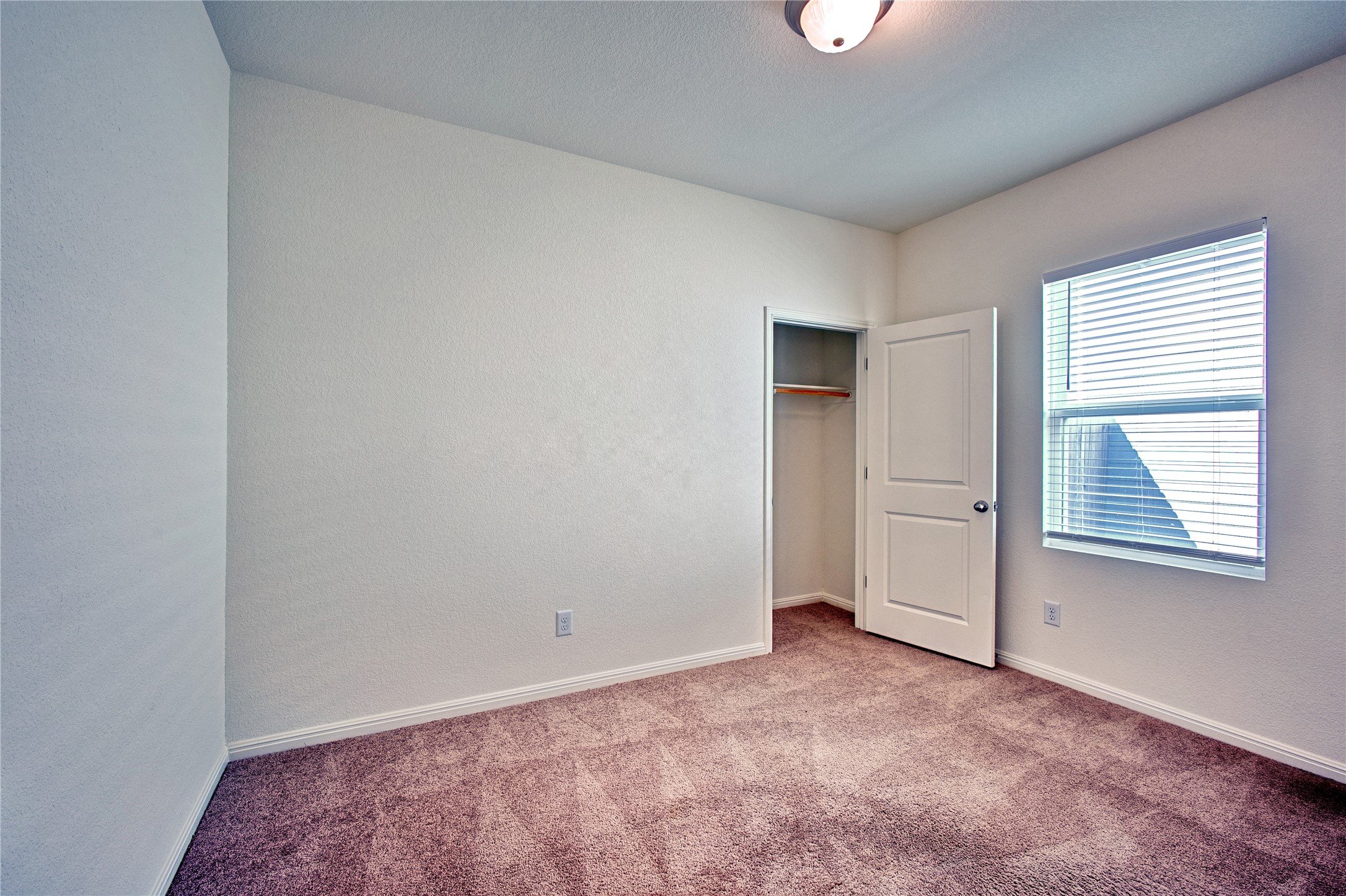 125 Woodpecker Run Jarrell, TX 76537 - Photo 16 of 22 an empty room with windows