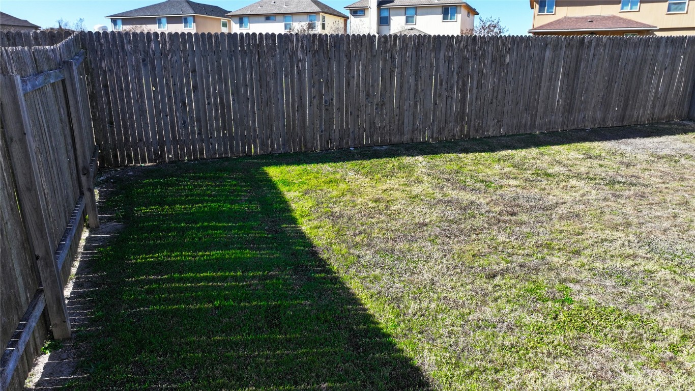 125 Woodpecker Run Jarrell, TX 76537 - Photo 20 of 22 View of fenced backyard