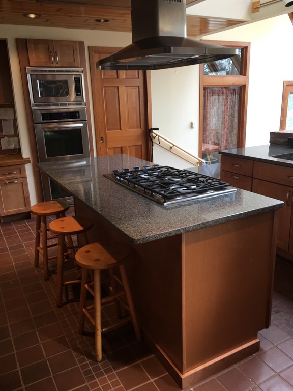 10 Lead Mine Road Leverett, MA 01054 - Photo 3 of 11 a stove top oven sitting inside of a kitchen