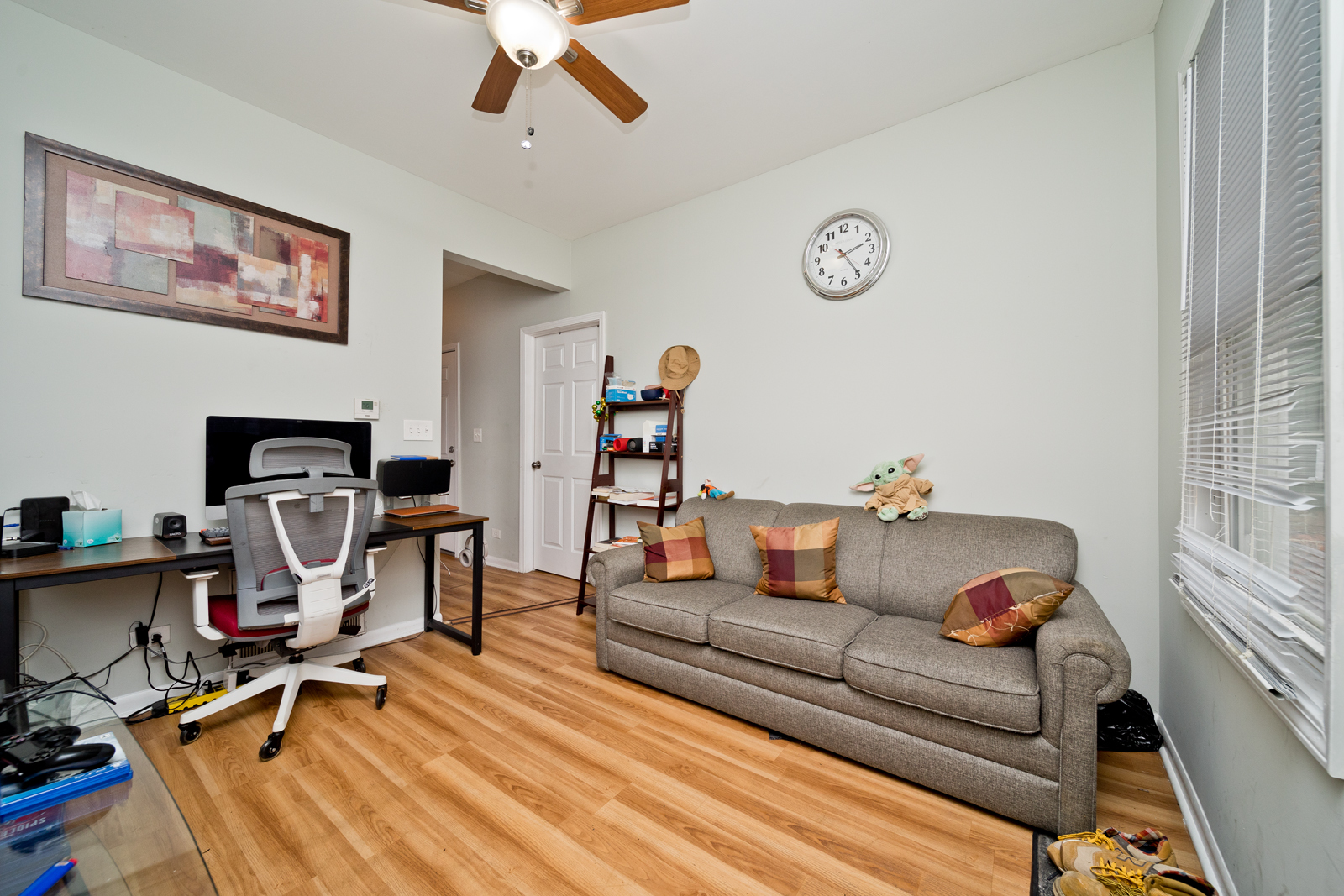 1431 West Flournoy Street, Unit 2R Chicago, IL 60607 - Photo 2 of 9 a living room with furniture and a wooden floor