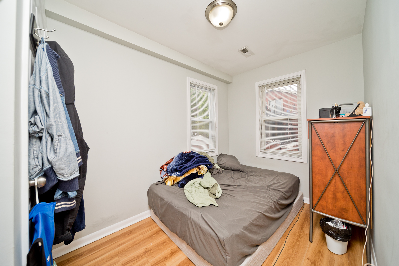 1431 West Flournoy Street, Unit 2R Chicago, IL 60607 - Photo 6 of 9 a living room with furniture and a window
