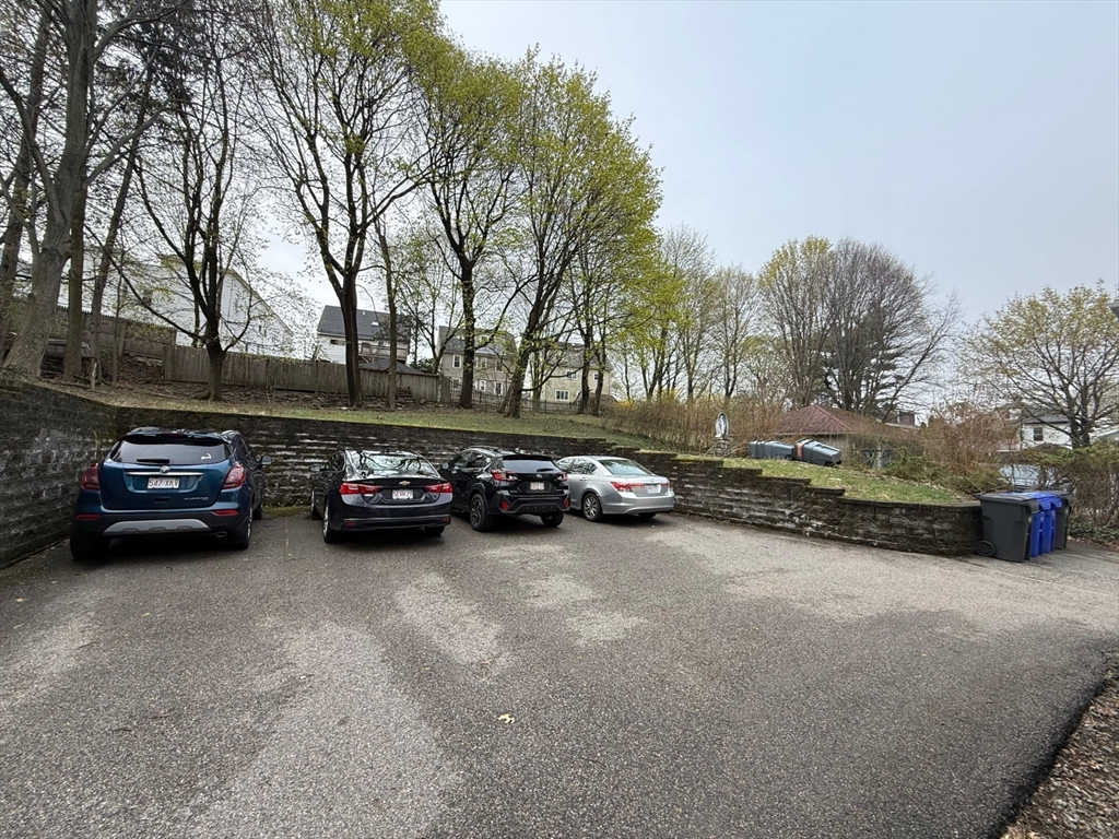 72 Bennett Street, Unit 72 Boston, MA 02135 - Photo 15 of 17 a view of a cars parked in a parking lot