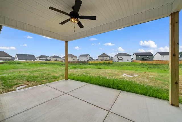 a house with swimming pool in front of it