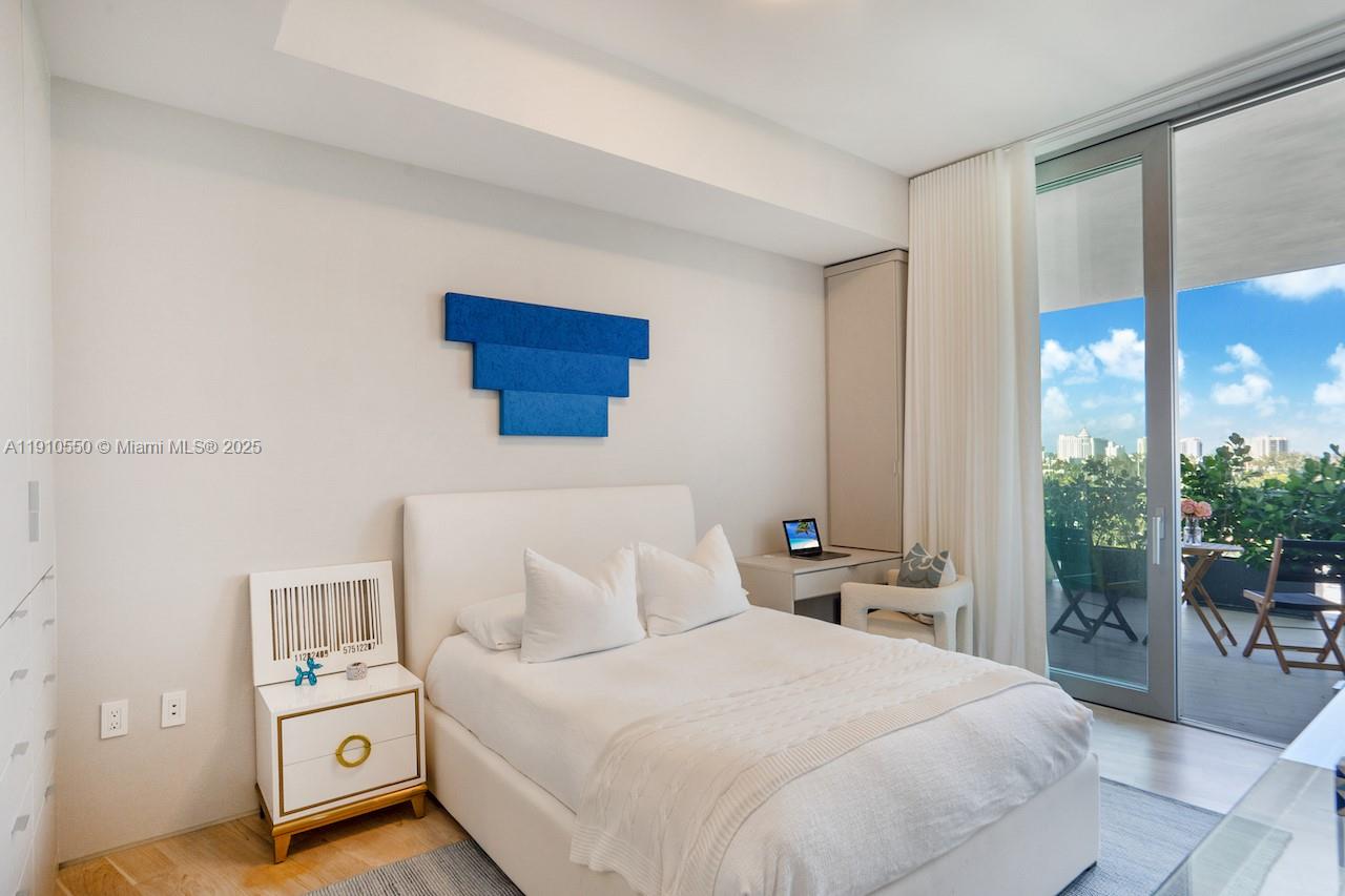 1300 Monad Terrace, Unit 7C Miami Beach, FL 33139 - Photo 13 of 16 a bedroom with a bed and a window