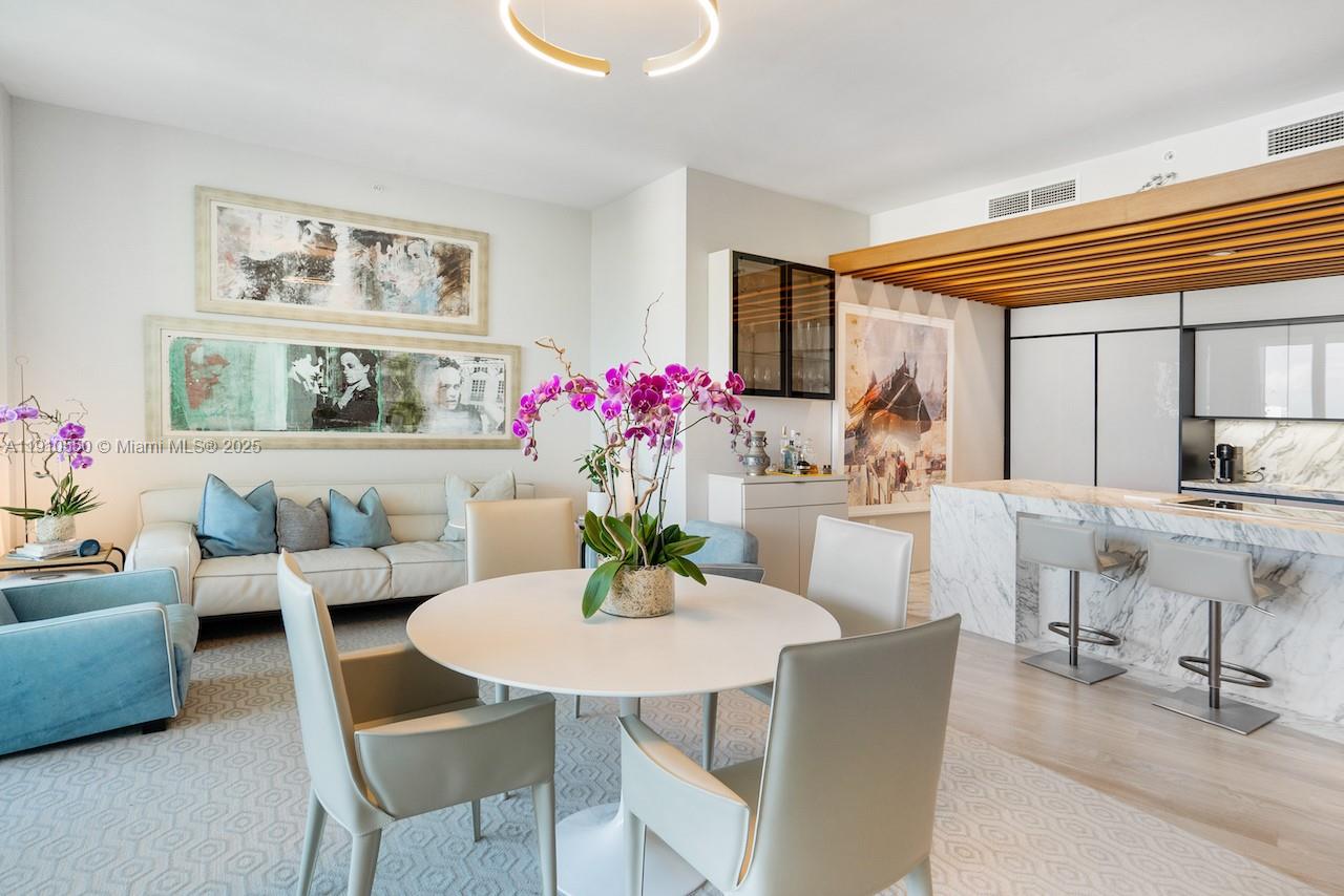 1300 Monad Terrace, Unit 7C Miami Beach, FL 33139 - Photo 5 of 16 a dining room with furniture and window
