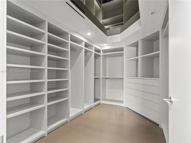 a room with furniture and flat screen tv