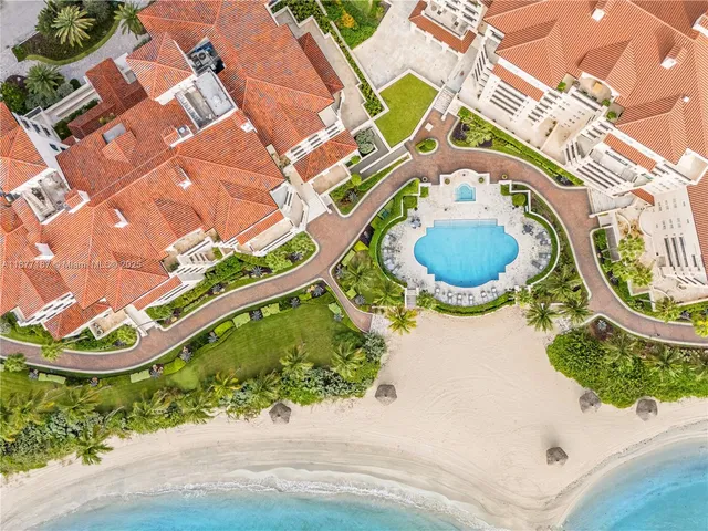 a view of a swimming pool with a garden