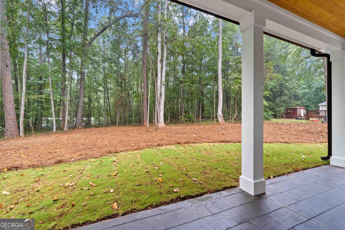 118 Southshore Road Eatonton, GA 31024 - Photo 35 of 42 a view of a backyard with garden