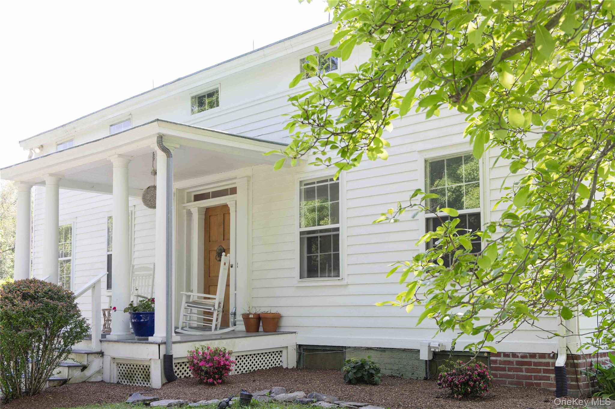 210 Middle Road Hudson, NY 12534 - Photo 2 of 42 Front porch with landscaped surroundings