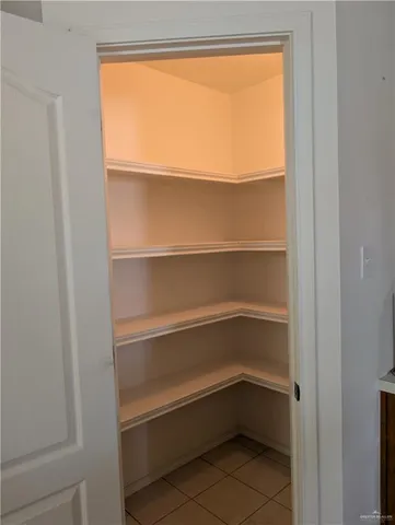a empty closet with white paint