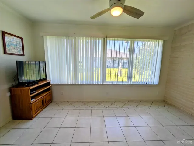 a view of kitchen with furniture and window