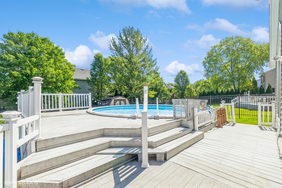 198 Foxmoor Road Fox River Grove, IL 60021 - Photo 4 of 26 a view of a house with wooden deck