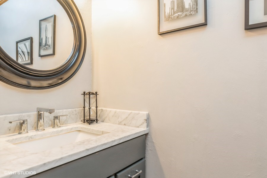 198 Foxmoor Road Fox River Grove, IL 60021 - Photo 8 of 26 a bathroom with a sink and a mirror