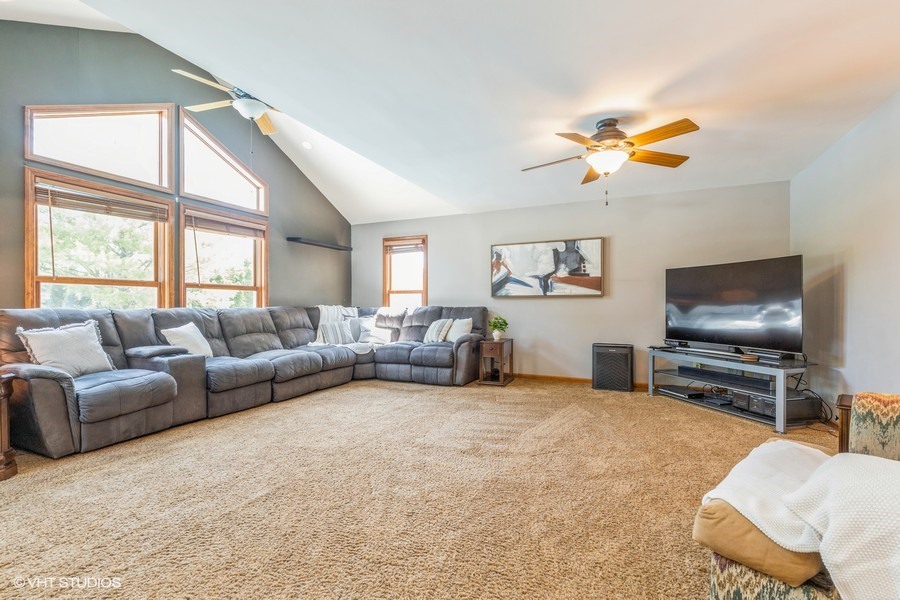 198 Foxmoor Road Fox River Grove, IL 60021 - Photo 9 of 26 a living room with furniture and a flat screen tv