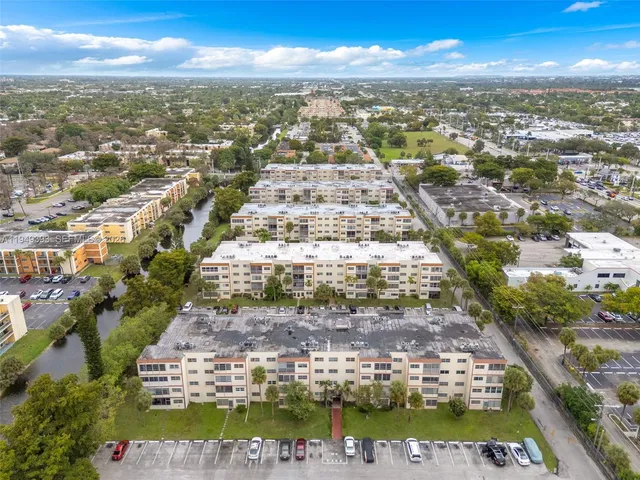 a view of a city with mountains in the background