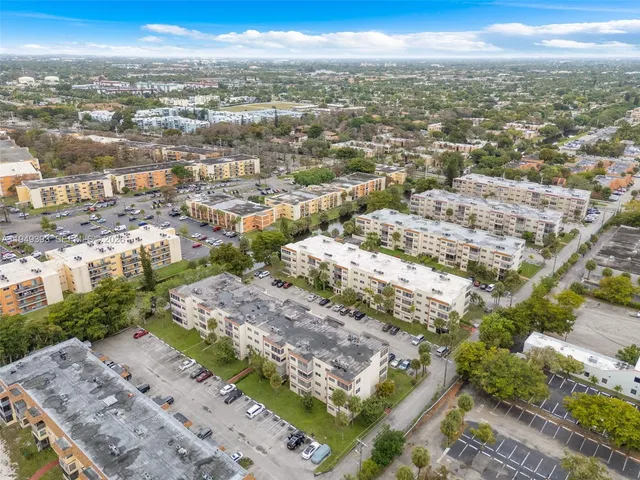a view of a city with mountains in the background