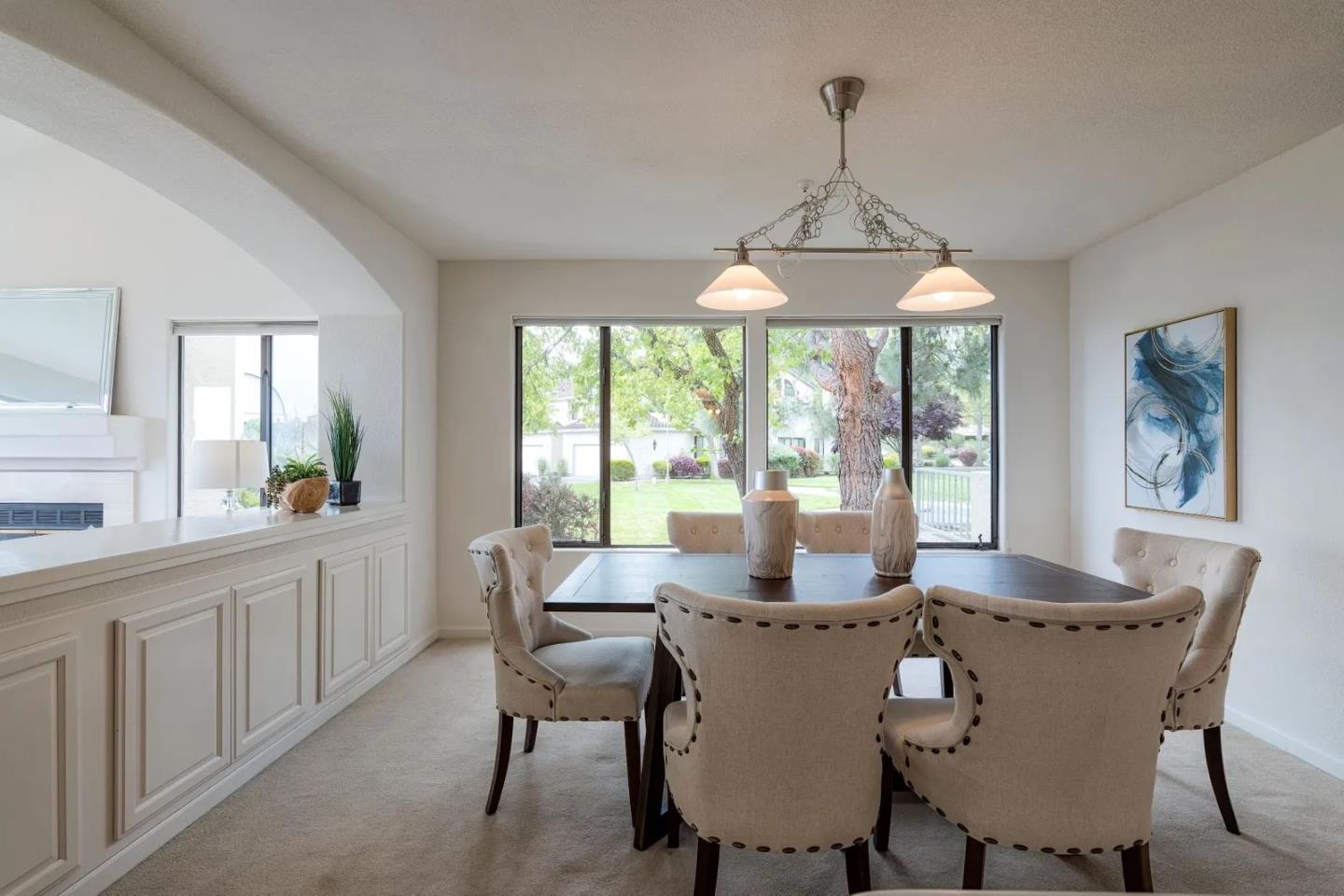 7 Iris Lane San Carlos, CA 94070 - Photo 7 of 17 a dining room with furniture a chandelier and window