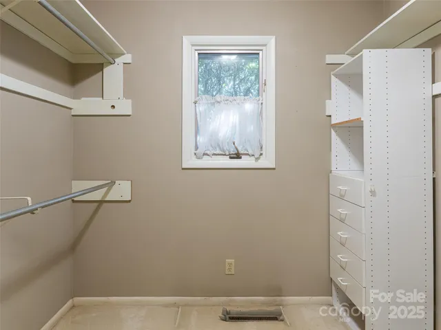 a bathroom with a shower sink and mirror