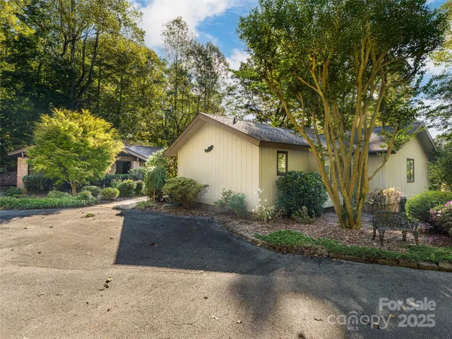 a house with trees in front of it