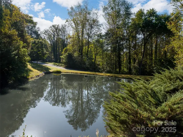 a balcony with trees in the background
