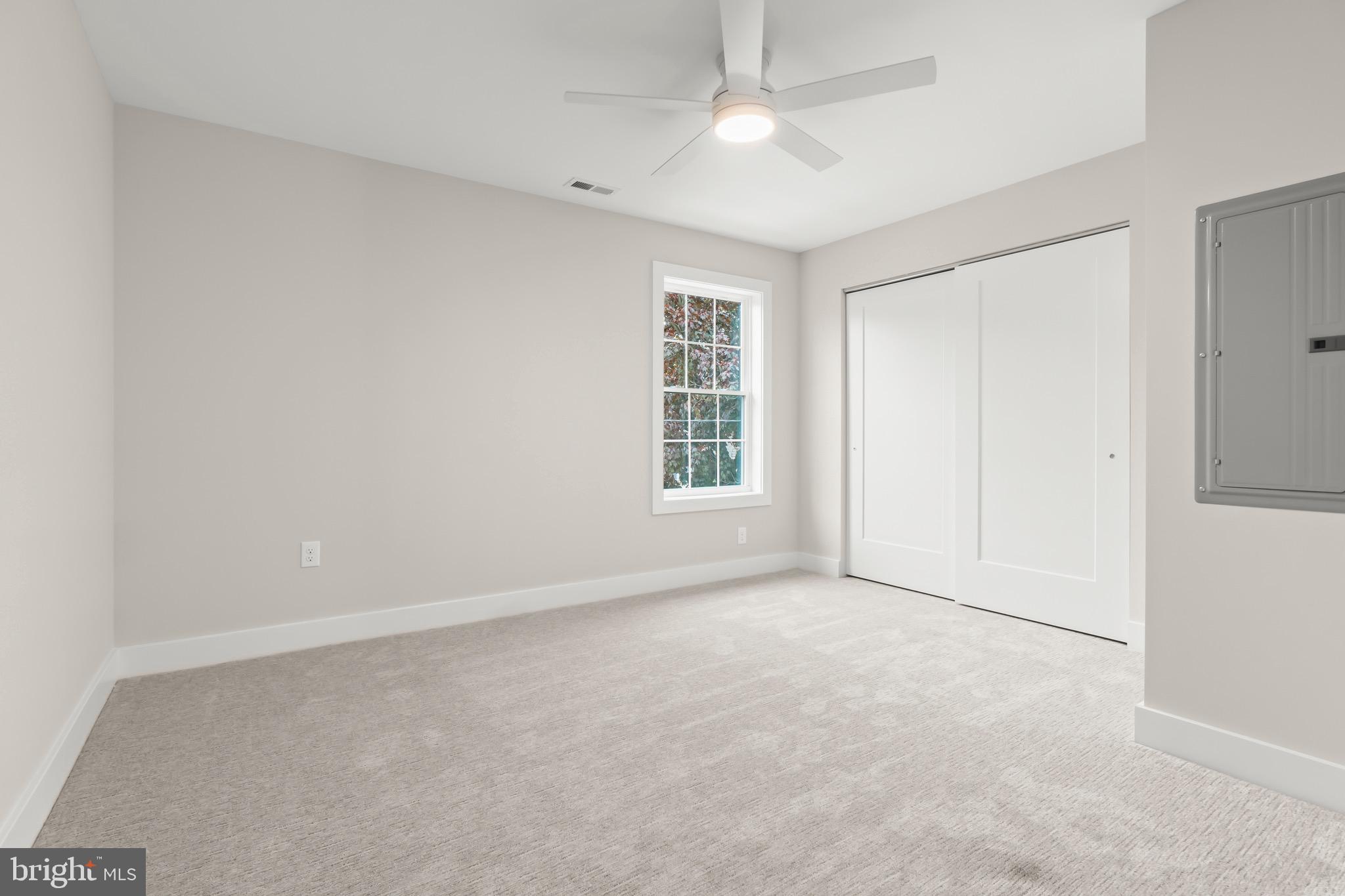 1505 Chestnut Avenue Haddon Heights, NJ 08035 - Photo 28 of 38 an empty room with windows and fan