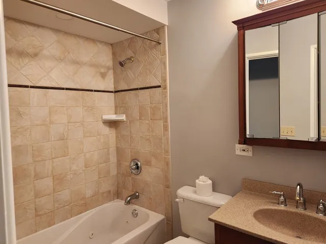 a bathroom with a sink and a bathtub