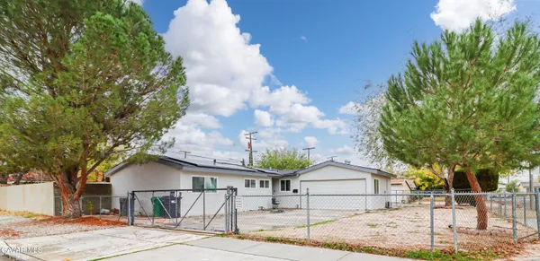 a view of house with outdoor space